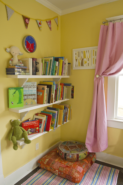 Simple kids reading nook idea - bookshelves with a pillow underneath