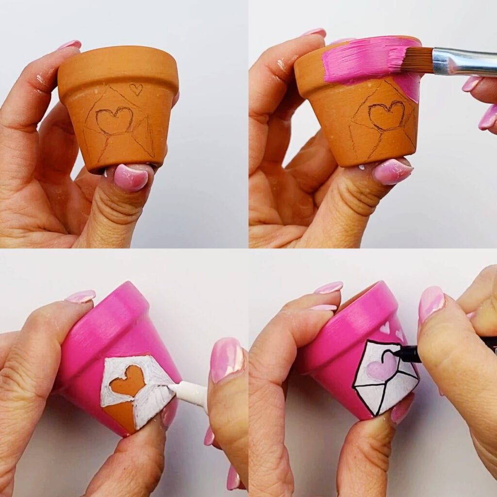 How to paint a Valentine's Day letter design on a flower pot - First the envelope holding a heart is sketched in pencil, then the outside of the flower pot is painted pink (leaving the design blank), the envelope is filled in with white paint makers and the heart pink, then black is used to outline the lines