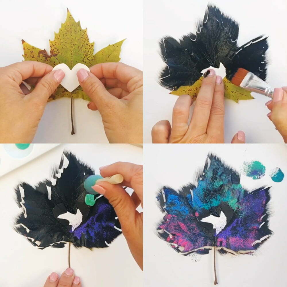 How to paint galaxy leaves step by step: first tape a heart to the middle, then paint the leaf black, then you add paint with a sponge brush