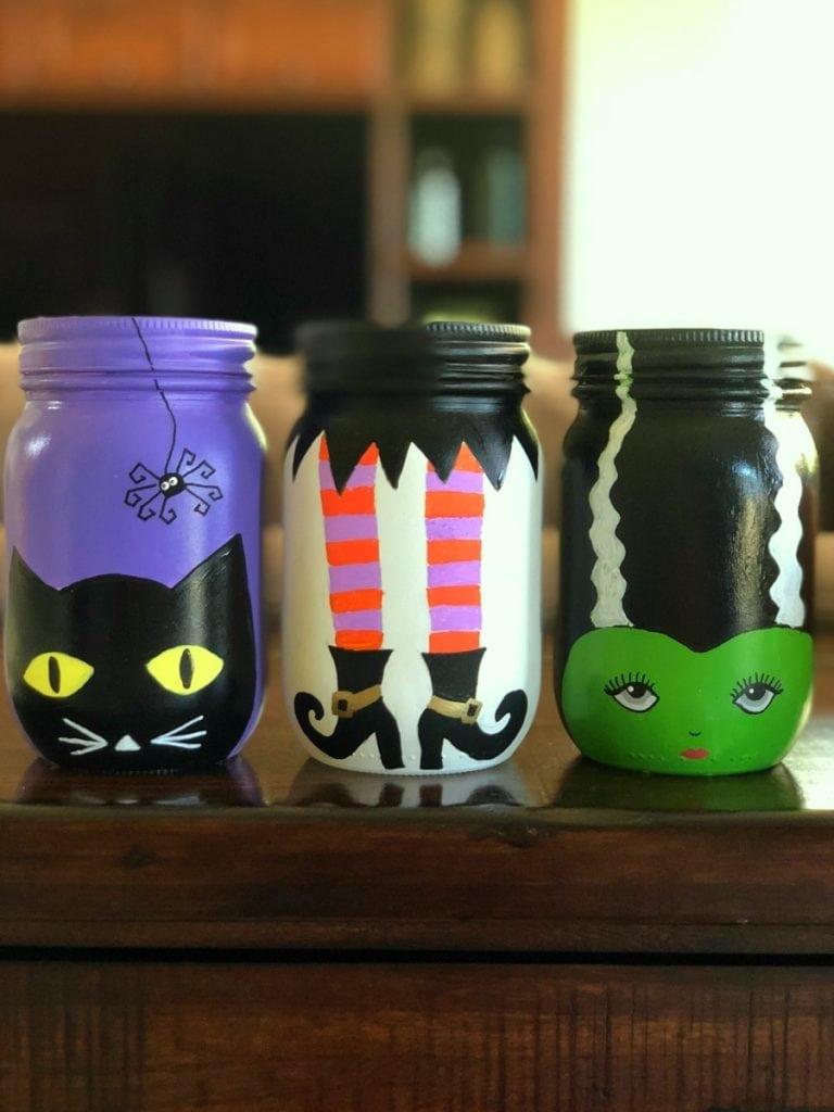 Mason Jars painted for Halloween used as a decoration