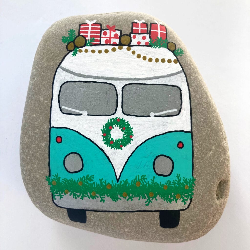 Completed Christmas Painted Rock Volkswagen Bus craft with black outlining