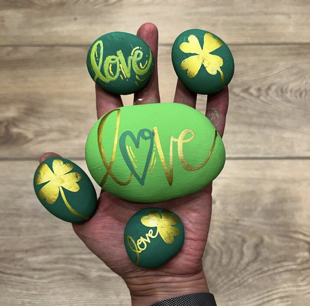 St. Patrick's Day Kindness Rocks to inspire you - they wrote messages with shiny paint