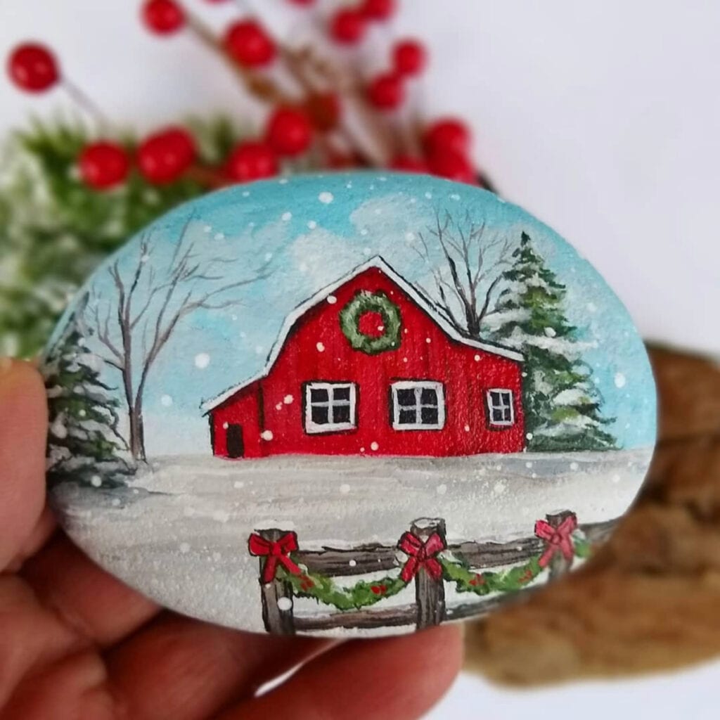 Barn decorated for the holidays rock painting