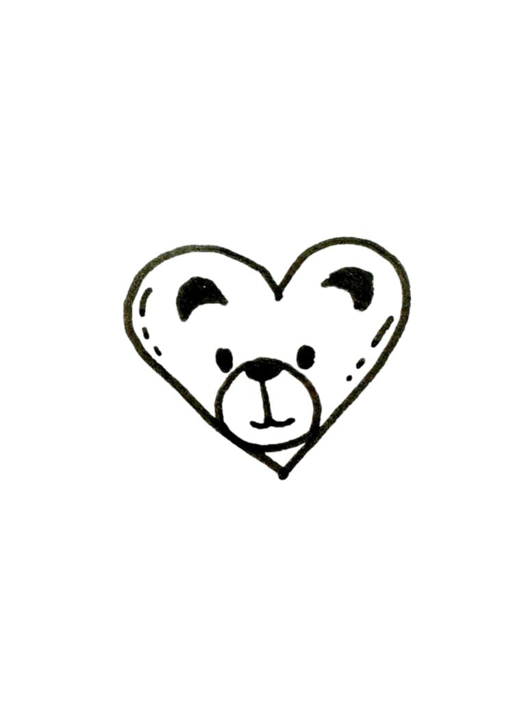 Bear drawing inside a heart that uses the heart's shape.