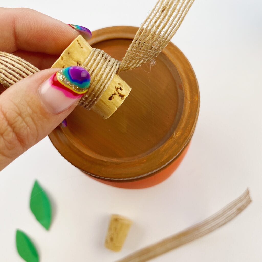 Gluing the cork stem on