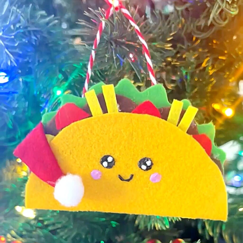 DIY Taco Ornament hanging on a Christmas tree